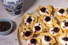 small pastries are on a plate with chocolate chips