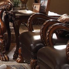 a living room filled with lots of brown furniture