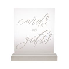 a white card with the words cards and gifts on it