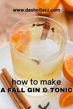 fall gin and tonic cocktail with cinnamon sticks on the side, garnished with an orange slice