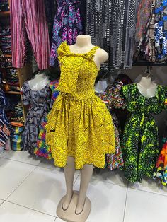 This African dress is made of African fabric known as Kitenge or Kente. Its a free size meant to fit all. Sizes can however be personalized. Size ; Free zize Bulk orders available Thank you for shoppibg with us! African Dress Short, Dress Kitenge, Free Size Dress, Kitenge Dress, Kitenge, African Fabric, Dress Short, African Dress, Dress Clothes For Women