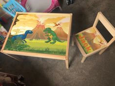 two children's toys are sitting on the floor in front of a table and chair