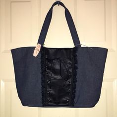 Denim Shoulder Bag Trendy Denim Shopping Bags, Denim Shoulder Bag With Adjustable Strap For Shopping, Black Denim Travel Bag, Denim Shopping Bag With Adjustable Strap, Denim Bags With Leather Handles For Shopping, Denim Tote Shoulder Bag For Shopping, Denim Shoulder Bag For Summer Shopping, Denim Blue Bag For Spring Shopping, Summer Denim Shoulder Bag For Shopping