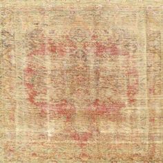 an old, faded rug with red and yellow colors on the bottom half of it