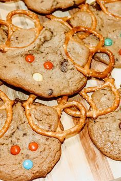 some cookies with pretzels and candy on them