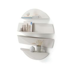 This set of four unique wall shelves are made of bent metal and can be used together to create an eye-catching wall display that doubles as storage. Made up of two large and two smaller shelves, each shelf can be mounted individually or placed together. Each shelf can also be mounted with the shelf surface facing upwards or downwards. Use Solis to display or store books, decorative items, candles, picture frames and more. Small shelf load capacity of 10 lbs (4.5 kg) and large of 15lbs (6.8 kg). Unique Wall Shelves, Large Shelf, Metal Wall Shelves, Small Shelf, Store Books, Large Shelves, Floating Wall Shelves, Standing Shelves, Small Shelves