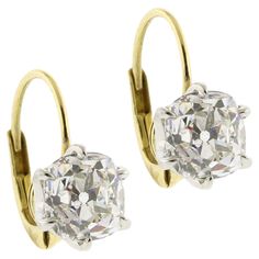 Indulge in the allure of timeless elegance with these exquisite Old Mine Cut Diamond Earrings. Featuring two stunning diamonds weighing 1.66 carats and 1.65 carats respectively, for a total of 3.31 carats, these earrings capture the enchanting brilliance of a bygone era. Each diamond, with a captivating H color and clarity ranging from VS1 to SI1, is securely set in a classic 6-prong setting that enhances its unique sparkle and fire. The old mine cut, known for its charming, slightly irregular s Luxury Vintage Earrings With Single Cut Diamonds, Luxury Platinum Diamond Earrings Hallmarked, Timeless Brilliant Cut Diamond Evening Earrings, Luxury Hallmarked Diamond Earrings For Formal Occasions, Classic Round Diamond Earrings For Evening, Timeless Brilliant Cut Diamond Earrings For Evening, Classic Evening Earrings With Single Cut Diamonds, Timeless Diamond Earrings With Brilliant Cut For Evening, Elegant Brilliant Cut Diamond Earrings For Formal Occasions