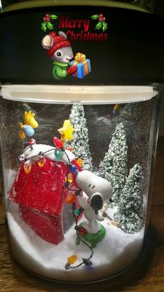 a snow globe with a christmas scene in it