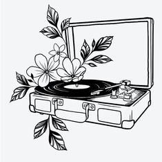 a record player with flowers on top of it