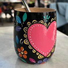 a cup with a straw sticking out of it