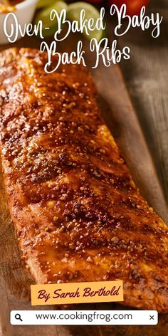 an oven baked baby back ribs on a cutting board