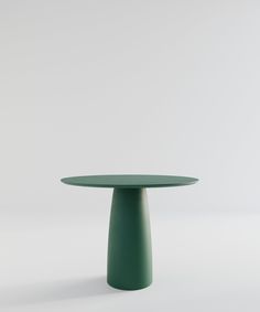 a green round table on a white background with no one around it or someone else