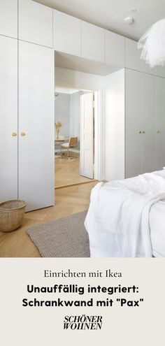 a bedroom with white walls and flooring has an advertisement for the company in german