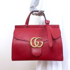 Click the 'See full description' link below for this item's description. Gucci GG Marmont Small Top Handle Bag Red Grained Leather Crossbody Pre-loved. A few small scratches throughout bag with heavier scratching underneath flap around lock. Small black pen mark on base. Wear on bottom corners and along edges. Light scuffing on GGs. Smudges throughout lining. Does NOT come with dustbag. *Gold Hardware. Push Lock Closure* Gucci GG Marmont Small Top Handle Bag Red Grained Leather Crossbody Pre-loved. A few small scratches throughout bag with heavier scratching underneath flap around lock. Small black pen mark on base. Wear on bottom corners and along edges. Light scuffing on GGs. Smudges throughout lining. Does NOT come with dustbag. *Gold Hardware. Push Lock Closure* × × × × × × × × × × × × Gucci Red Marmont Bag, Small Top Handle Bag, Black Pen, Gucci Gg Marmont, Gg Marmont, Handle Bag, Leather Bags, Blue Bags, Small Tops