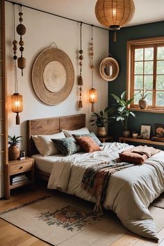 a bed sitting in a bedroom next to a window with hanging decorations on the wall