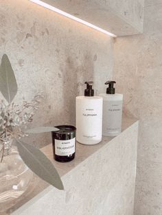 three different types of skin care products sitting on a counter