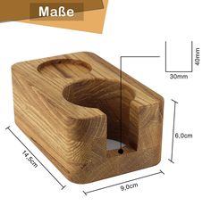 a wooden cutting board with measurements for the top and bottom part, including an unfinished knife holder