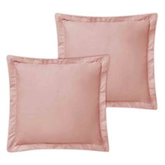 two pink pillows with ruffled edges