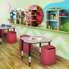 children's tables and chairs in a brightly colored room