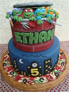 an image of a birthday cake with teenage mutant cakes on it