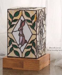 a stained glass block with a rabbit on it