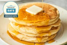 a stack of pancakes with butter on top