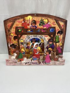 a nativity scene with figurines on display