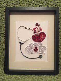 a medical stethoscope with a red heart and flowers in it on a green background