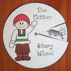 the mitten story wheel has an image of a boy with a mouse on it