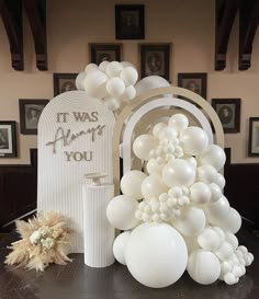 balloons and decorations on a table in a room