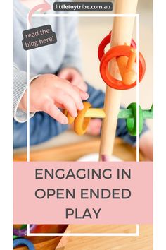 a child playing with an open ended play toy in front of the text engaging in open ended play