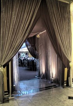 an image of a room that is decorated with curtains