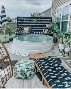 an above ground pool in the middle of a backyard