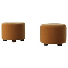 two small stools sitting next to each other