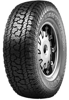 an all terrain tire on a white background