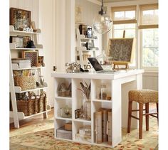 a living room filled with furniture and lots of shelves