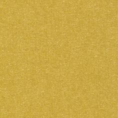 an image of a plain yellow fabric textured with some sort of stain on it