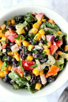 black bean taco salad recipe in a white bowl