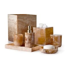 marble bathroom accessories including soap dispenser, soap dish and toothbrush holder