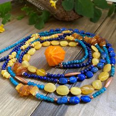 Baltic Amber Jewelry Collection By @Crystalhealthgoddess All My "Baltic Amber Necklace Collection" Is Created Using 100% Natural And Genuine Baltic Amber Imported Directly From Lithuania. Description: Absolutely Stunning 40" Inches Extra Long Gemstone Necklace. I Call This Necklace "Blue Dream" And It's Created Using Genuine Baltic Amber, Lapis Lazuli, Blue Apatite And Copper. To Create This Beautiful Necklace I Also Selected A Variety Of Different Types Of Amber Such As Butterscotch Amber Large Amber And Turquoise Necklaces, Amber Multi-strand Beaded Necklace Gift, Amber Multi-strand Jewelry With Gemstone Beads, Handmade Amber Multi-strand Necklace, Baltic Amber Necklace, Baltic Amber Jewelry, Blue Dream