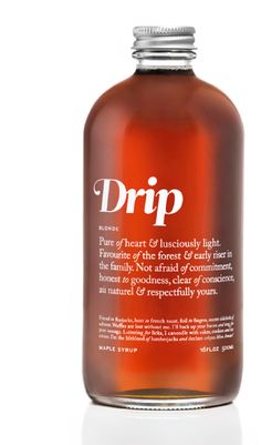 a bottle of liquid with the words drip written on it and an orange label that says,