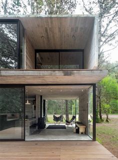 a house that is sitting on top of a wooden platform