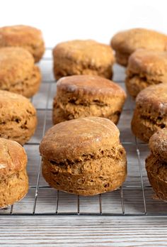 several muffins cooling on a wire rack