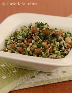 mixed sprouts salad in a white bowl