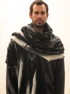 "Mens poncho, Blanket scarf, Huge black scarf, Tribal clothing, Nuno felt scarf, Wool scarf, Gothic scarf, Fur cape, Goth cape, Shaman cape This is a really huge scarf. You can wrap yourself from shoulders to knees or have it around your neck a few times. It is handmade in a nuno felt technique from extra fine merino wool on black cotton gauze. It is very soft, lightweight and warm. I make each scarf myself using only natural materials in my \"Slowlab workshop.\" If you are in a hurry and need y Black Shawl Scarf For Winter, Black Winter Shawl Wrap, Black Shawl Wrap For Winter, Black Winter Scarf Wrap, Black Scarf For Fall, Black Winter Wrap, Black Wool Shawl For Winter, Black Wool Winter Shawl, Black Shawl For Winter