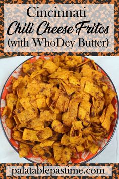 a bowl filled with cheesy potato chips on top of a table