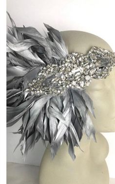 Gatsby Headpiece -Halloween- Silver Feather Headdress - Head Wrap- 1920 Hair Accessory-Speakeasy- Handmade in USA- Charleston Hello,      This feather head wrap is made with goose feathers. they are naturally white and I paint the gold and silver ones so you will see some of the white feathers come through. The rhinestone piece measures about 6" wide and the feathers are 6-7" long . I can make them any size.  They are placed on a stretch band that fits any adult head size and very comfortable. 1920s Womens Headpiece, Adjustable Gold Gatsby Headpiece, 1920s Feather Headpiece, 1920 Hair, Adjustable Vintage Headpieces With Feathers, Orange Fascinators, Feather Hair Pieces, Vintage Adjustable Feather Headpieces, Gatsby Headpiece