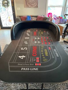 a black table that has some casino games on it