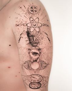 a man's arm with tattoos on it and an image of a person in the middle