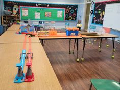 an empty classroom with toys on the desks